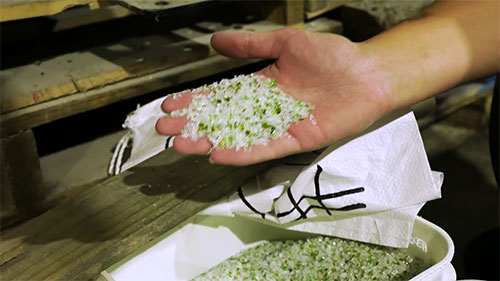 碎玻璃变成沙子