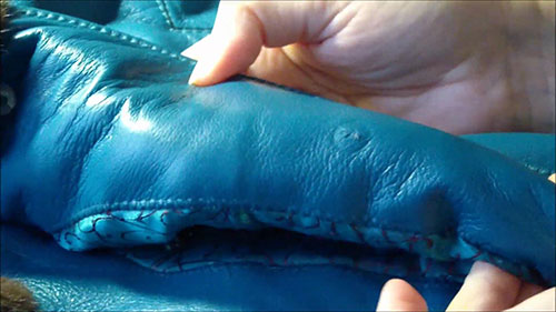 如何在皮夹克上缝制纽扣