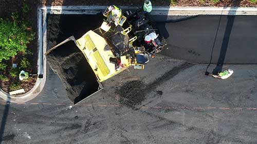 沥青摊铺机的工作原理和商业铺路工程成功的关键